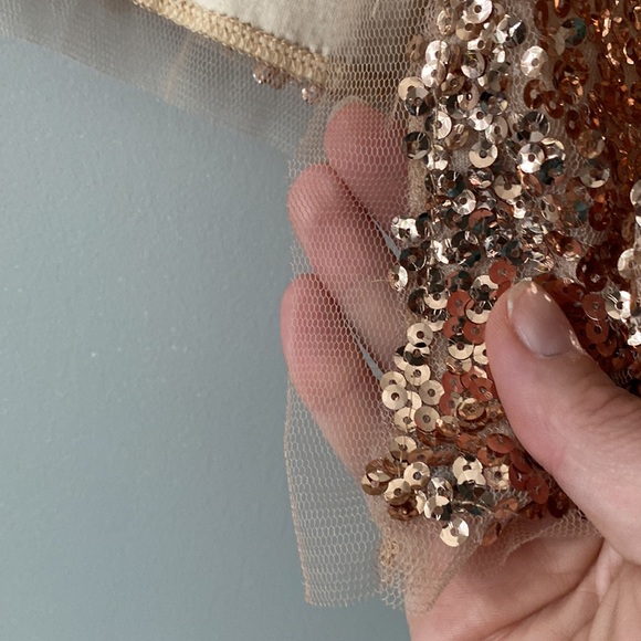 More gold then rose gold, but not that yellowish gold sequin petite cardigan. - Picture 3 of 5